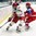 SPISSKA NOVA VES, SLOVAKIA - APRIL 17: Artyov Borshyov #19 of Belarus plays the puck while Russia's Kirill Slepets #8 defends during preliminary round action at the 2017 IIHF Ice Hockey U18 World Championship. (Photo by Steve Kingsman/HHOF-IIHF Images)

